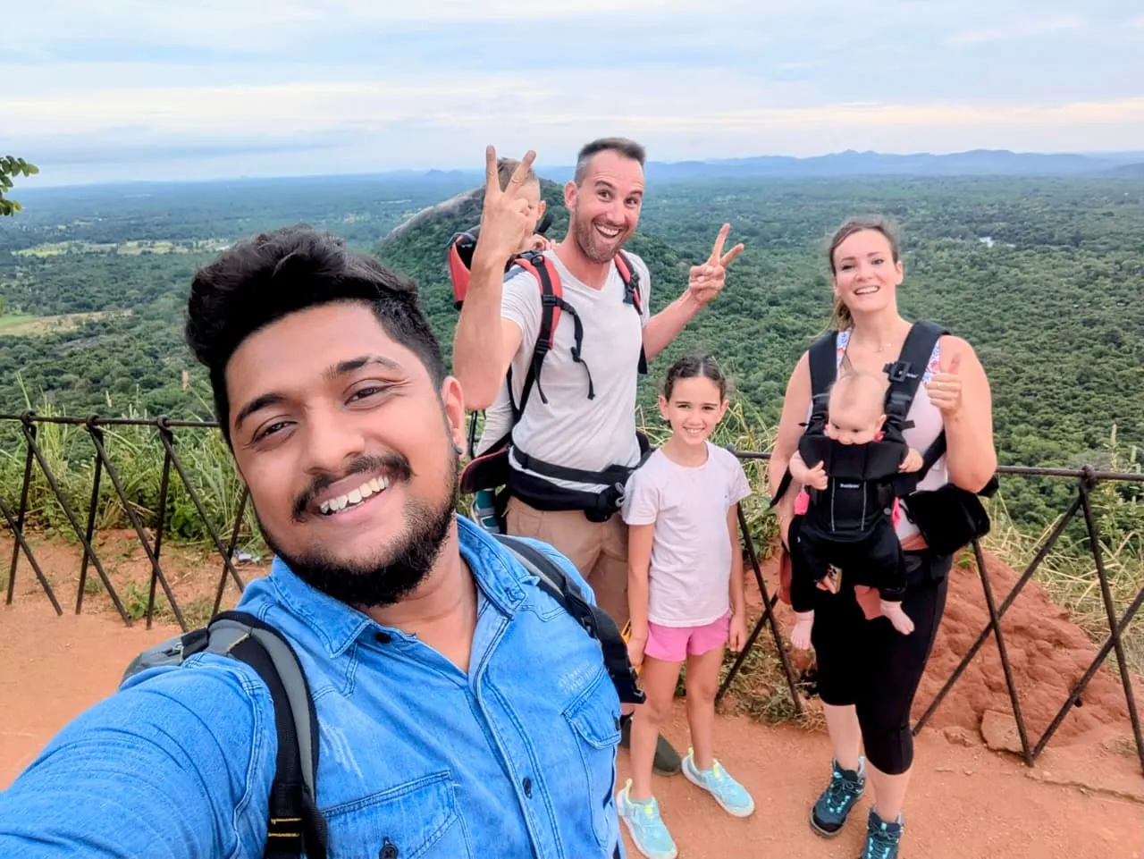 Shashen, our founder, with a family of guests at Sigiriya