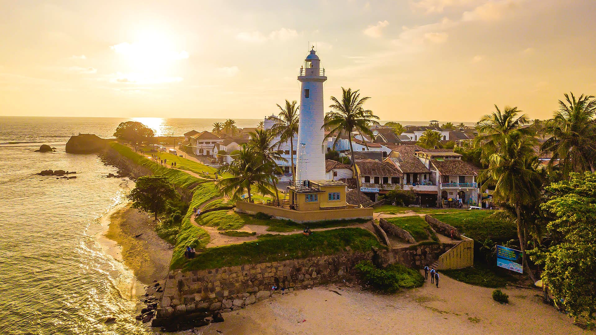 Galle Fort lighthouse and ramparts at sunset